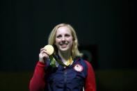 2016 Rio Olympics - Shooting - Final - Women's 10m Air Rifle Finals - Olympic Shooting Centre - Rio de Janeiro, Brazil - 06/08/2016. Virginia Thrasher (USA) of USA poses with her gold medal. REUTERS/Edgard Garrido