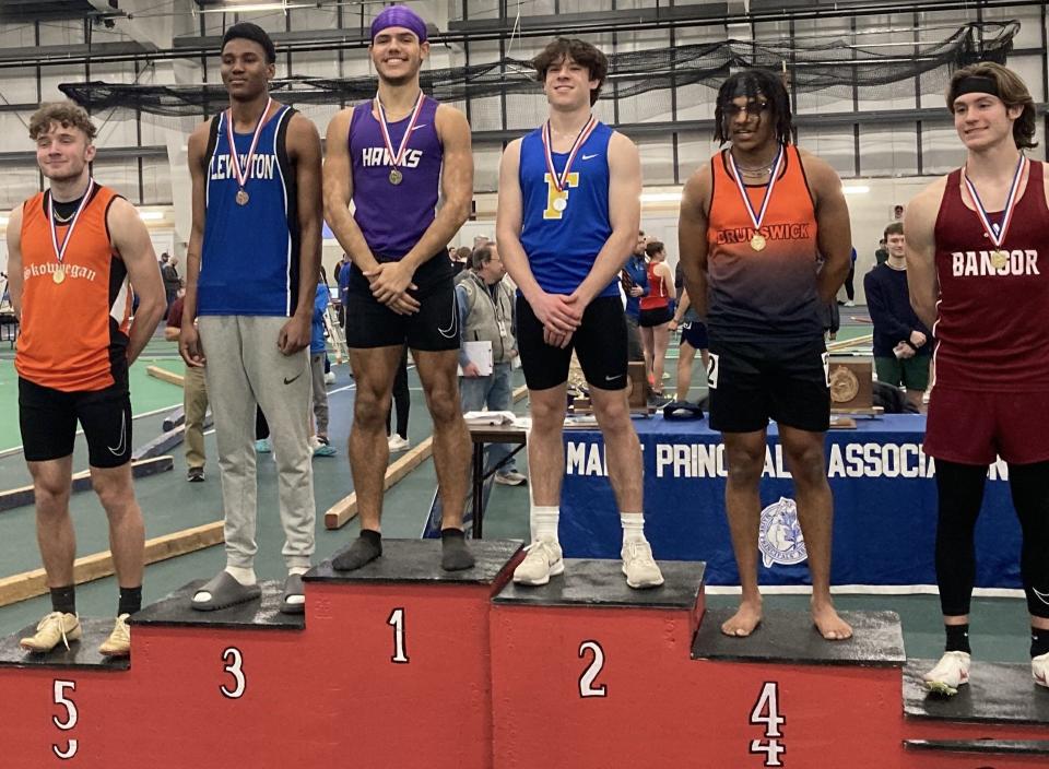 Marshwood High School's Andre Clark, third from left, won both the 55-meter and the 200 at Monday's Class A state championship meet at the University of Southern Maine in Gorham. Clark broke his own school record in the 55 with a time of 6.38 seconds.