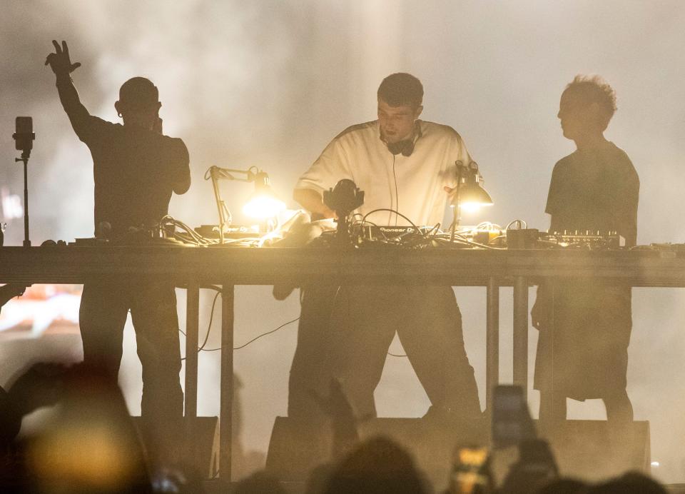 Skrillex (left), Fred Again and Four Tet perform together at the Coachella stage during the Coachella Valley Music and Arts Festival at the Empire Polo Club in Indio, Calif., Saturday, April 22, 2023.