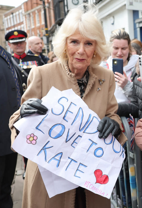 Queen Camilla receives a message of support for Catherine, Princess of Wales from well-wishers during her visit to the Farmers' Market on March 27, 2024 in Shrewsbury, England. <p>Chris Jackson/Getty Images</p>