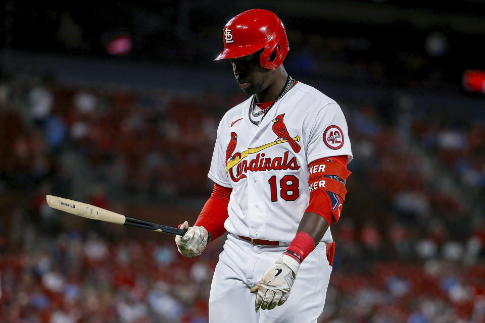 St. Louis Cardinals' Jordan Walker looks at his broken bat as he walks to the dugout after grounding out during the seventh inning of the team's baseball game against the Pittsburgh Pirates on Thursday, April 13, 2023, in St. Louis. (AP Photo/Scott Kane)