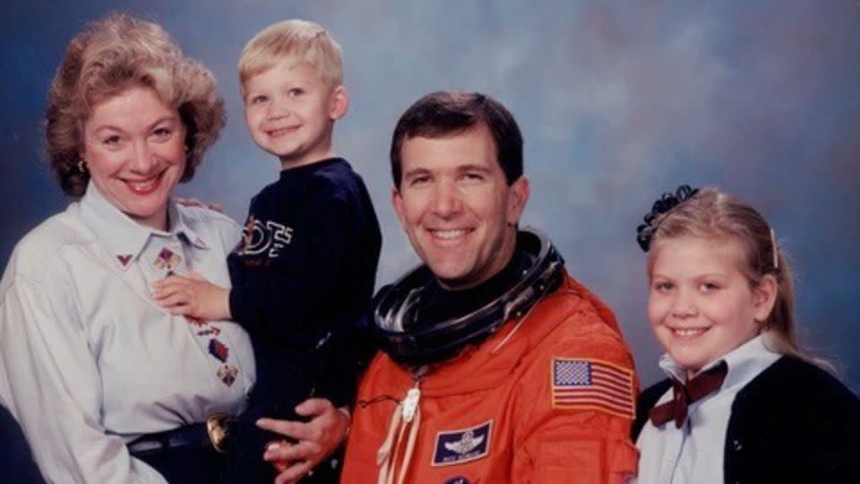 Evelyn and Rick D. Husband are seen with their children, Matthew and Laura. - Courtesy of Evelyn Husband