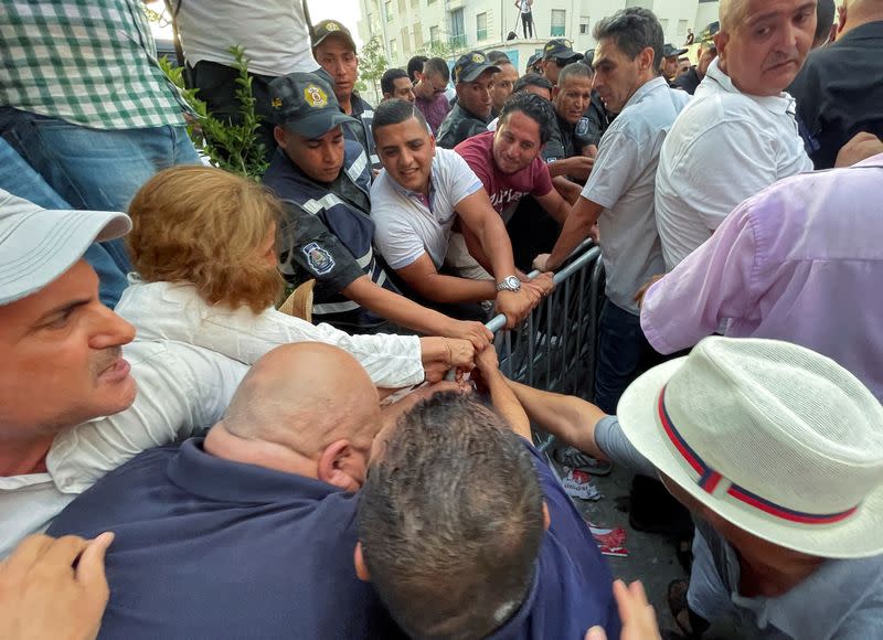 Supporters of Tunisia's Free Constitutional Party protest in Tunis