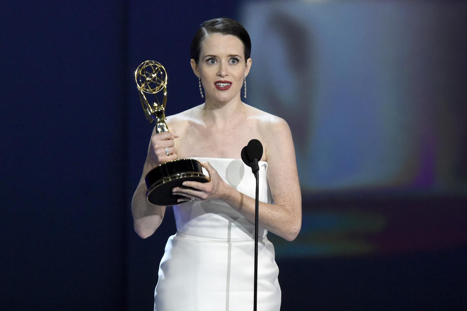 Claire Foy accepts the award for outstanding lead actress in a drama series for "The Crown" at the 70th Primetime Emmy Awards on Monday, Sept. 17, 2018, at the Microsoft Theater in Los Angeles. (Photo by Chris Pizzello/Invision/AP)