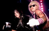 <p>Sixx and Neil performing onstage in Connecticut in 1985. </p>