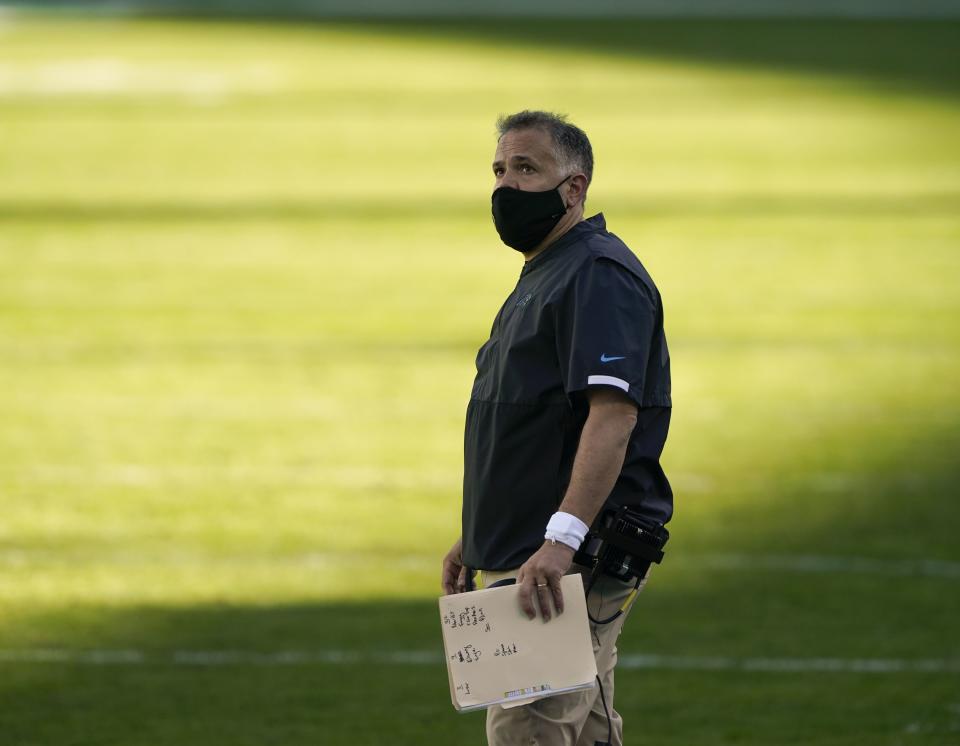 Carolina Panthers head coach Matt Rhule watches during the first half of an NFL football game against the Denver Broncos Sunday, Dec. 13, 2020, in Charlotte, N.C. (AP Photo/Brian Blanco)