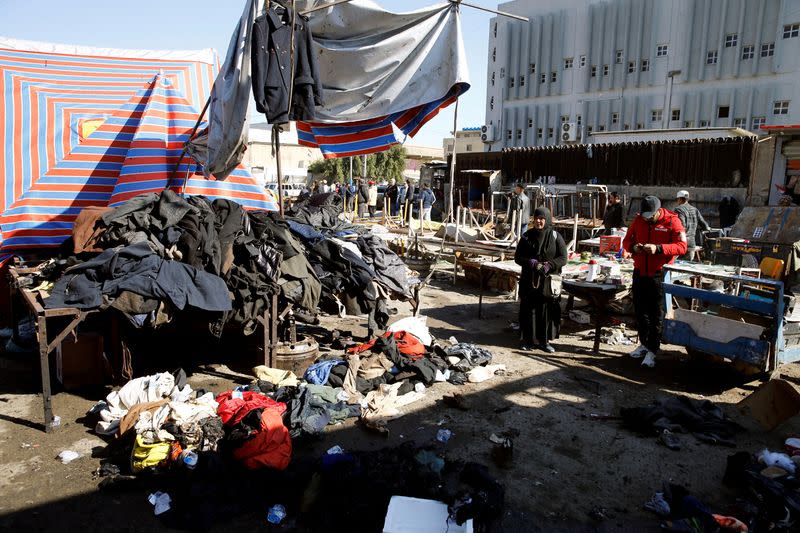 FILE PHOTO: The site of a twin suicide bombing attack in a central market is seen in Baghdad