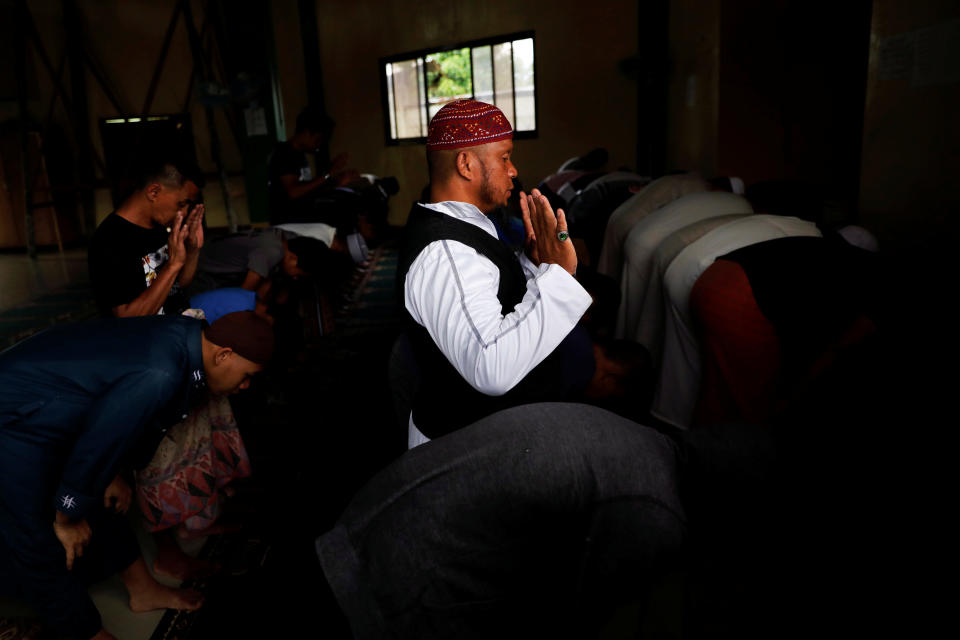 Mohammad Ali Acampong, 42, prays inside a mosque at Mipaga, Marawi City, Lanao del Sur province, Philippines. (Photo: Eloisa Lopez/Reuters)