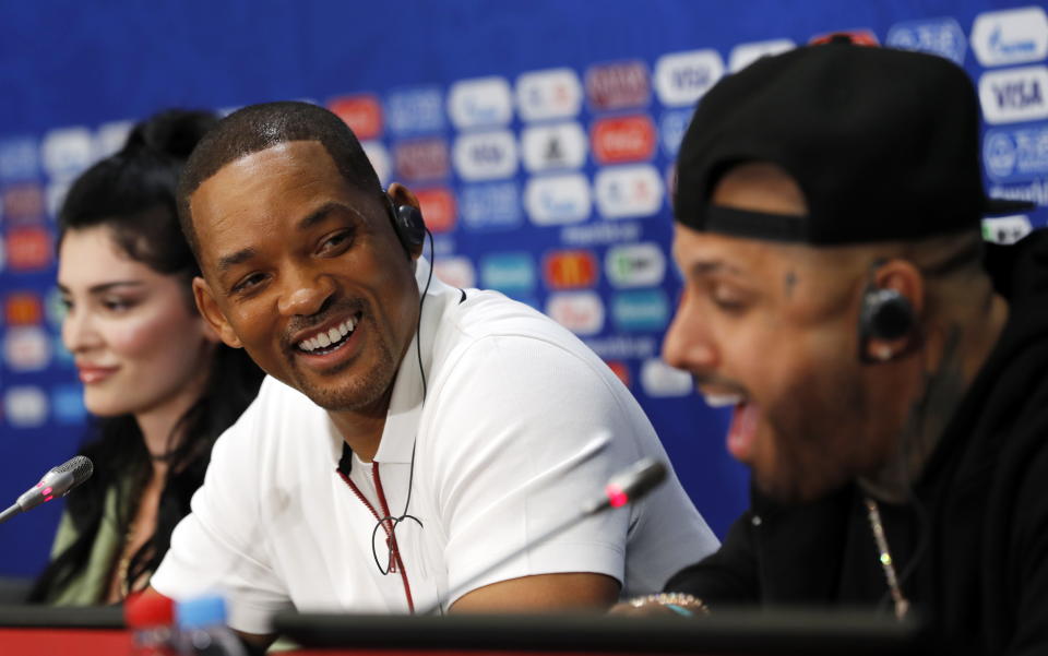 Nicky Jam, Will Smith, and Era Istrefi at the World Cup on July 13. (Photo: EFE)