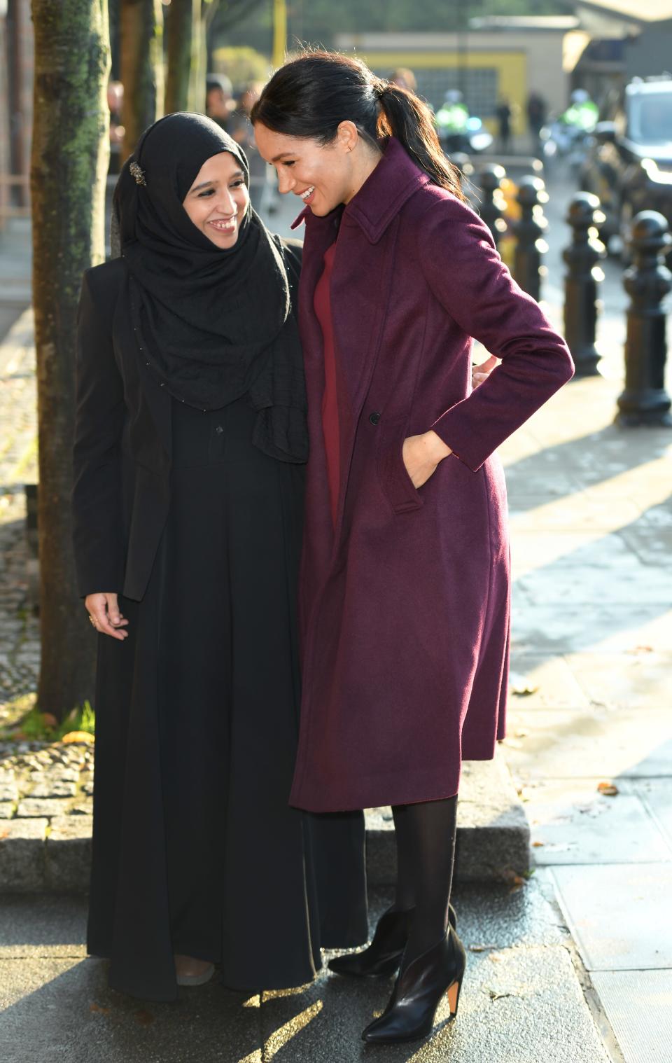 Meghan Markle made a surprise appearance in London today wearing a Club Monaco coat. See her full look, and shop her affordable coat, here.