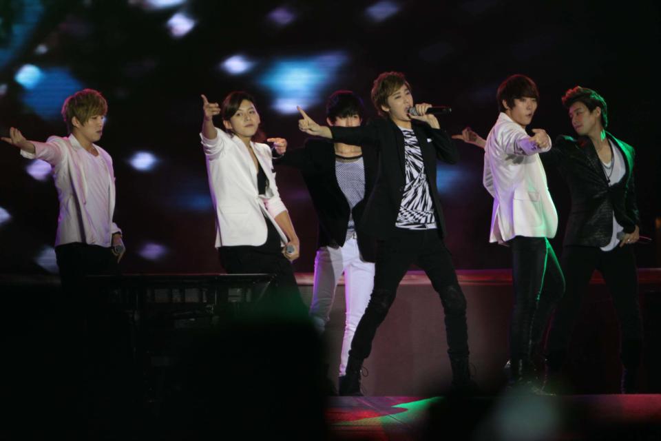 Kpop group "UKISS" performs for the crowd during the "Dream Kpop Fantasy Concert" held at the Mall of Asia grounds in Pasay city, south of Manila on 19 January 2013.  (George Calvelo/NPPA Images)