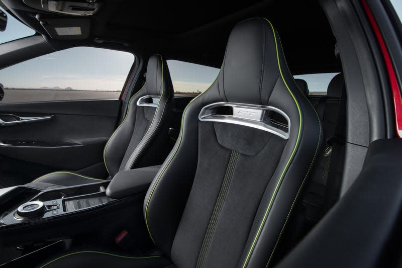 A black and green sport bucket seat in the 2023 Kia EV6 GT