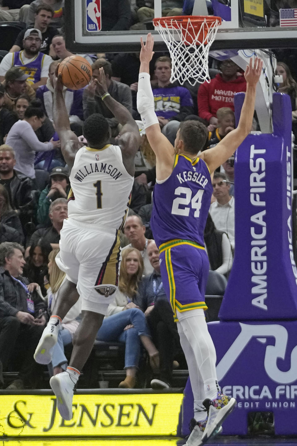New Orleans Pelicans forward Zion Williamson (1) goes to the basket as Utah Jazz center Walker Kessler (24) defends during the first half of an NBA basketball game Monday, Nov. 27, 2023, in Salt Lake City. (AP Photo/Rick Bowmer)