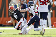 Cleveland Browns quarterback Baker Mayfield (6) is hurt trying to tackle Houston Texans strong safety Justin Reid (20) during the first half of an NFL football game, Sunday, Sept. 19, 2021, in Cleveland. (AP Photo/Ron Schwane)