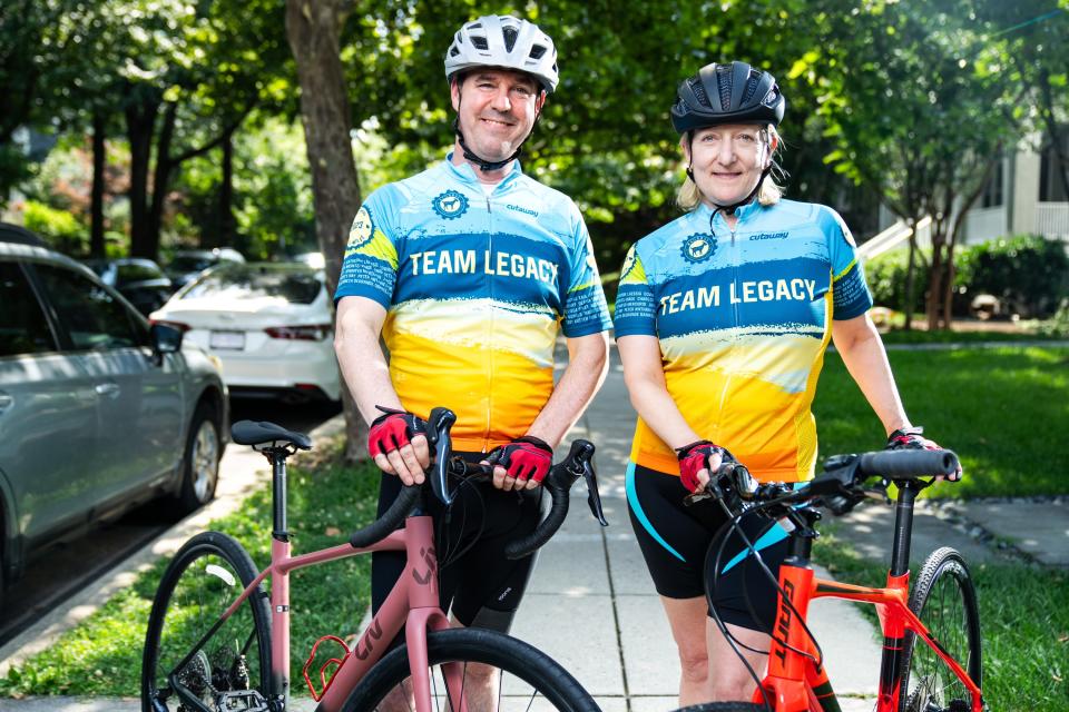 Rachel Kaul and her partner, Cliff Mauton, pose for a portrait in Washington, D.C., Wednesday, July 12, 2023. The two will be participating in RAGBRAI, which was co-founded by Kaul’s father, Don Kaul.