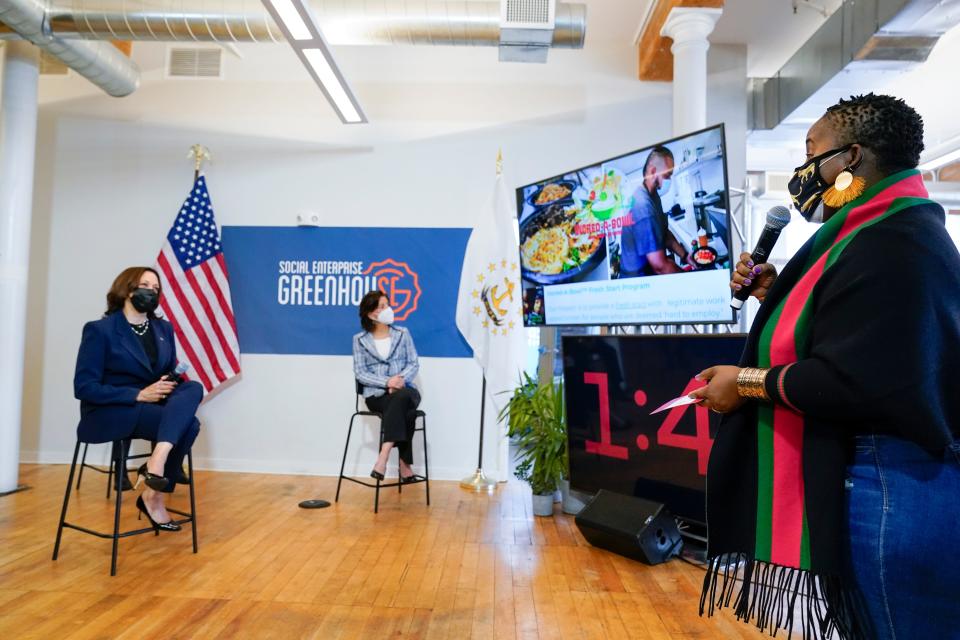 Clinton-Spellman, right, talks about her Incred-A-bowl Food Company and her Fresh Start employment program during a meeting with Vice President Kamala Harris, left, and Secretary of Commerce Secretary Gina Raimondo at the Social Enterprise Greenhouse in Providence on May 5.