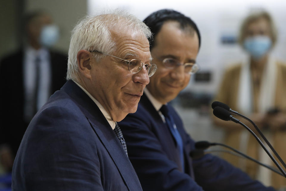 The European Union's Foreign Policy Chief Josep Borrell, left, and Cyprus' Foreign Minister Nikos Christodoulides speak during a joint news conference at the Cypriot foreign ministry on Thursday, June 25, 2020. Borrell is in Cyprus to discuss developments in the EU's southeastern-most corner that borders a tumultuous region. (AP Photo/Petros Karadjias)