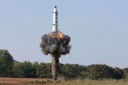 FILE PHOTO - The scene of the intermediate-range ballistic missile Pukguksong-2's launch test in this undated photo released by North Korea's Korean Central News Agency (KCNA) May 22, 2017. KCNA/via REUTERS/File photo