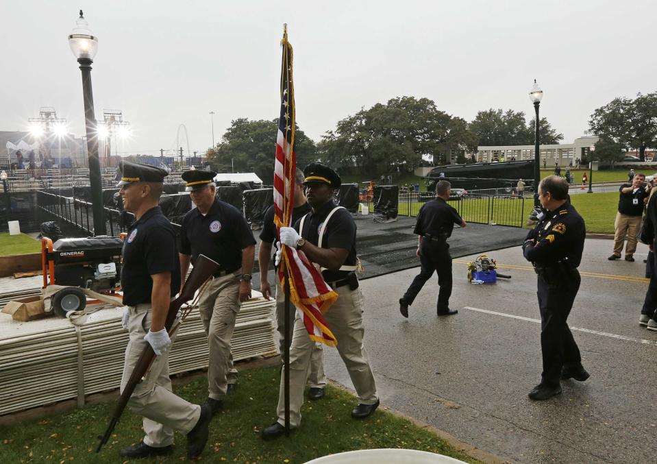 A Dallas Police color guard rehearses in Dallas' Dealey Plaza for Friday commemorations of the 1963 assassination of U.S. President John F. Kennedy as preparations continue for the ceremonies in Dallas