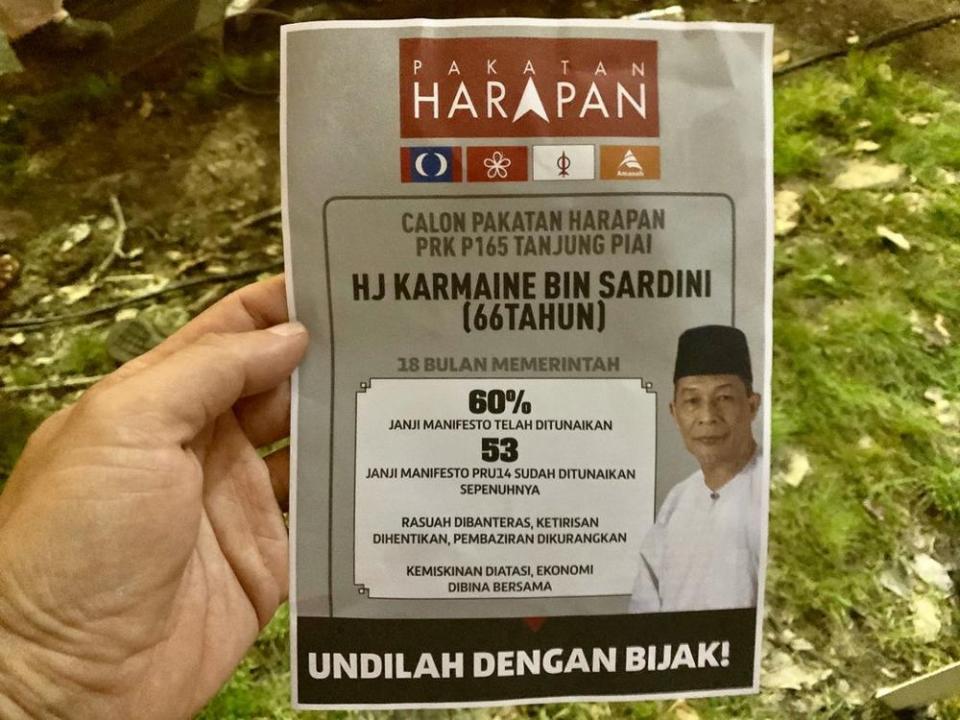 The Pakatan Harapan (PH) flyer on the front featuring information calling on Muslims to vote for Karmaine Sardini has been making its rounds at the ruling coalition’s Ceramah Mega in Kukup here November 13, 2019. — Pix by Ben Tan