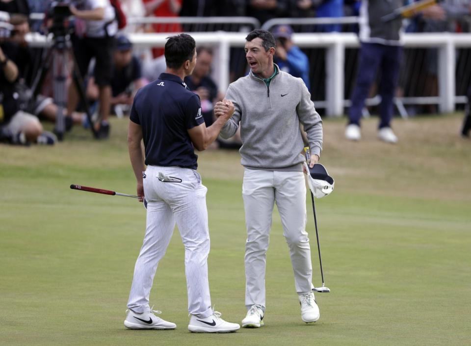 Norway’s Viktor Hovland and Northern Ireland’s Rory McIlroy shake hands after their rounds during day three of The Open at the Old Course, St Andrews (Richard Sellers/PA) (PA Wire)