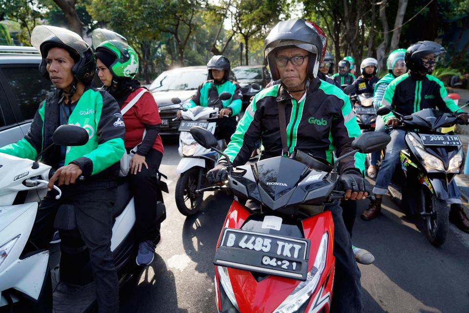 Grab vs. Go-Jek: Inside Asia’s Battle of the 'Super Apps'