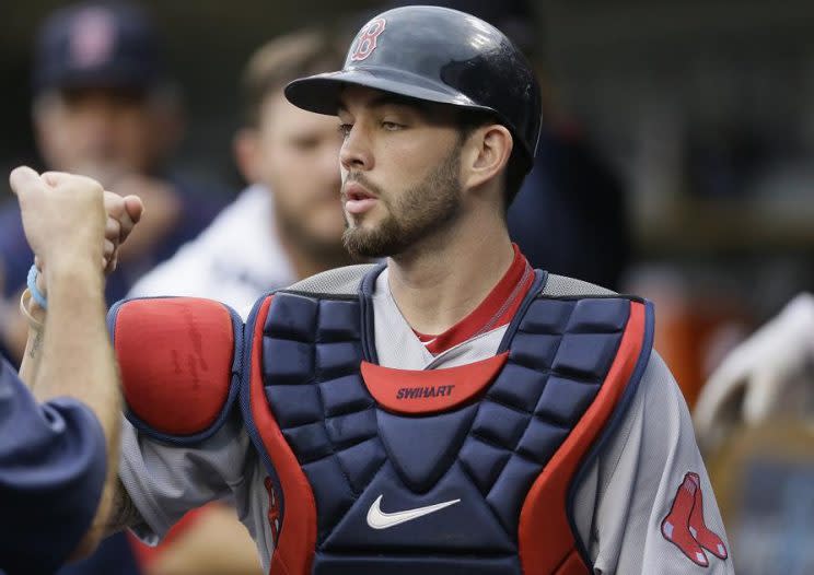 Boston Red Sox catcher Blake Swihart is struggling to return the ball to the pitcher. (AP)