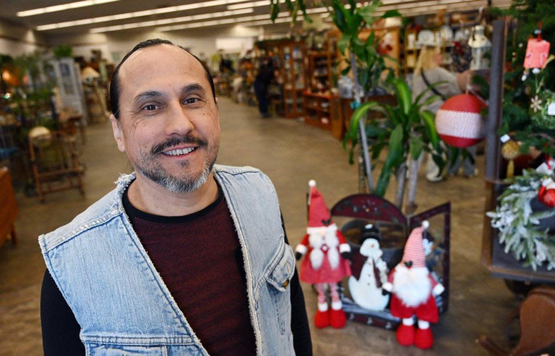 Gabe Thomas shows off eclecticHouse, a community of vendors located in a building at Bullard and Palm avenues where new, used, vintage and artisanal items are sold. Photographed Wednesday, Nov. 22, 2023 in Fresno.