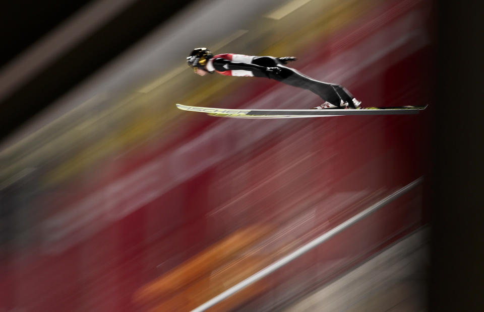 <p>Andreas Wellinger, of Germany, soars through the air during the men’s normal hill individual ski jumping qualifier ahead of the 2018 Winter Olympics in PyeongChang, South Korea, Thursday, Feb. 8, 2018. (AP Photo/Matthias Schrader) </p>