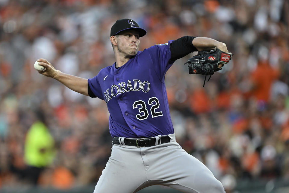 Colorado Rockies starting pitcher Chris Flexen throws to a Baltimore Orioles batter during the first inning of a baseball game Saturday, Aug. 26, 2023, in Baltimore. (AP Photo/Terrance Williams)