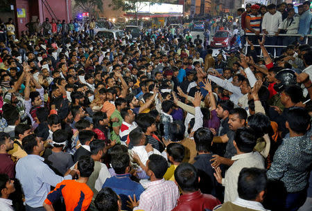 Demonstrators shout slogans outside a multiplex during a protest against the release of "Padmaavat" in Ahmedabad, January 23, 2018. REUTERS/Amit Dave