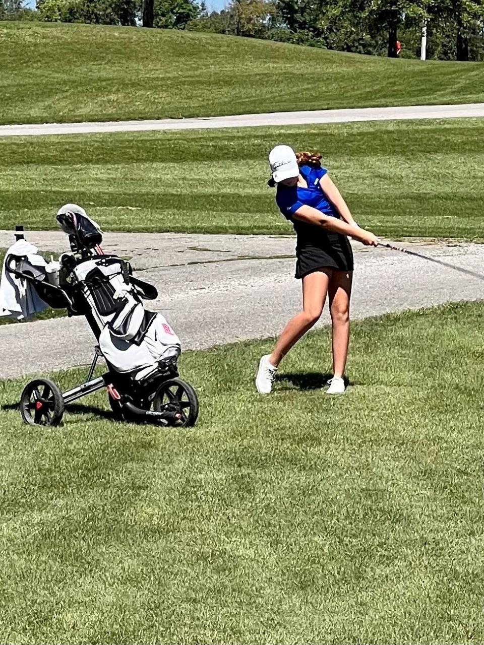 Highland's Ceci Grassbaugh chips onto the green at Oakhaven during the second Mid Ohio Athletic Conference Golf Tournament on Tuesday.