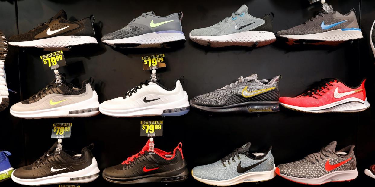 Nike shoes are seen displayed at a sporting goods store