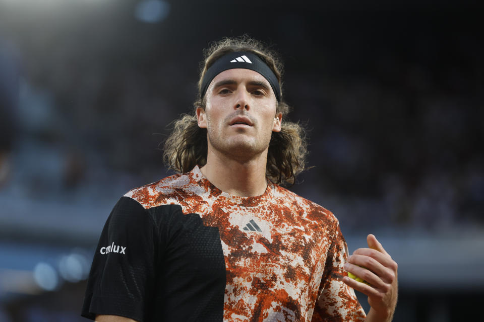 Greece's Stefanos Tsitsipas prepares to serve against Spain's Carlos Alcaraz during their quarterfinal match of the French Open tennis tournament at the Roland Garros stadium in Paris, Tuesday, June 6, 2023. (AP Photo/Jean-Francois Badias)