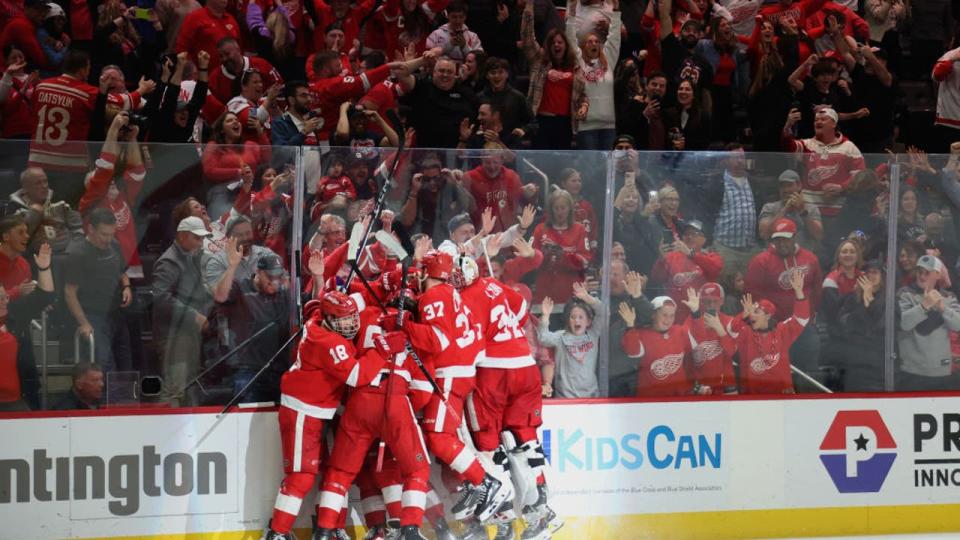 <div>DETROIT, MICHIGAN - APRIL 15: Lucas Raymond #23 of the Detroit Red Wings celebrates his game winning overtime goal with teammates to defeat the Montreal Canadiens 5-4 at Little Caesars Arena on April 15, 2024 in Detroit, Michigan. (Photo by Gregory Shamus/Getty Images)</div>