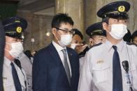 Former Japanese Justice Minister Katsuyuki Kawai leaves the venue of lower house plenary session in Tokyo