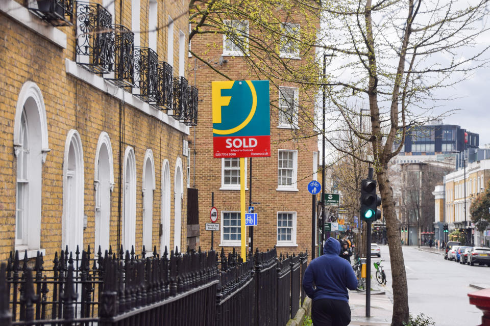 House prices LONDON, UNITED KINGDOM - 2023/03/31: A Foxtons estate agency 'Sold' sign is seen in central London, as UK house prices fall at the fastest annual rate since 2009. (Photo by Vuk Valcic/SOPA Images/LightRocket via Getty Images)