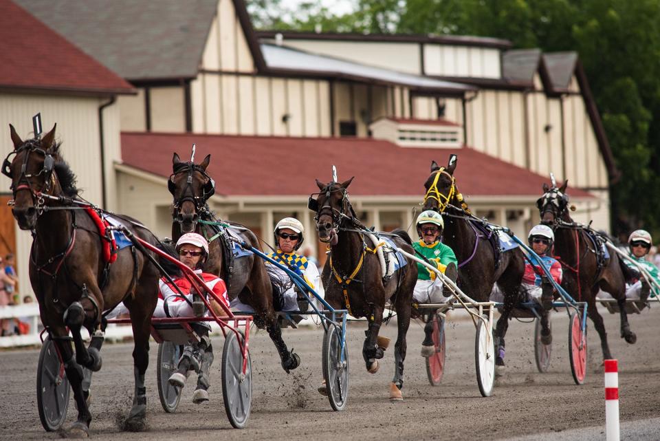 Racers complete the first lap in the New York Excelsior Series B 3-year-old colts and geldings first division race during the Grand Cicruit races at the Goshen Historic Track in Goshen, NY on Sunday, July 4, 2021. Torrey Pines won the $6,500 purse. Kelly Marsh/For the Times Herald-Record