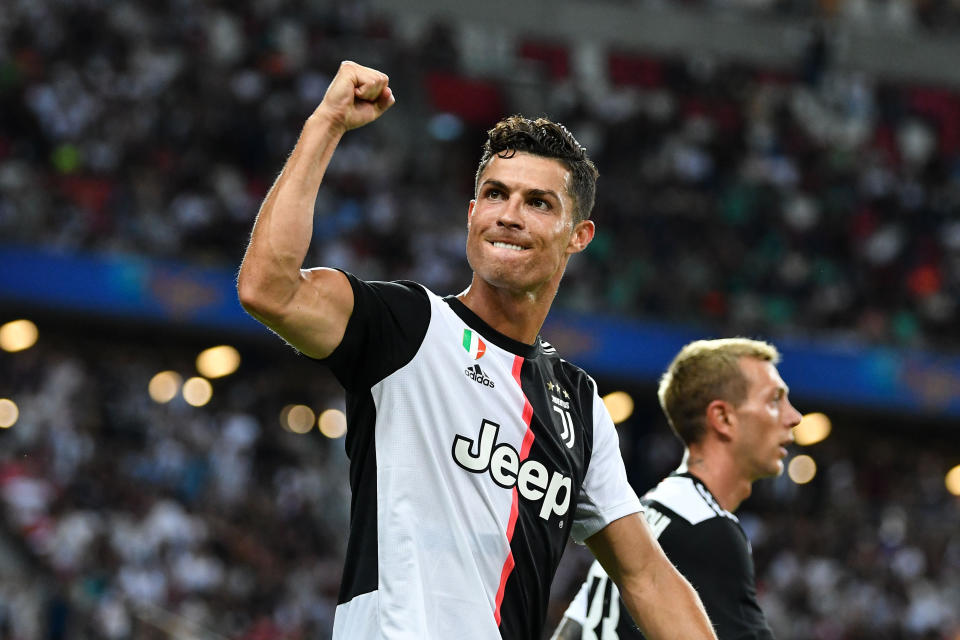 SINGAPORE, SINGAPORE - JULY 21: Cristiano Ronaldo of Juventus celebrates scoring his side's second goal during the International Champions Cup match between Juventus and Tottenham Hotspur at the Singapore National Stadium on July 21, 2019 in Singapore. (Photo by Thananuwat Srirasant/Getty Images)