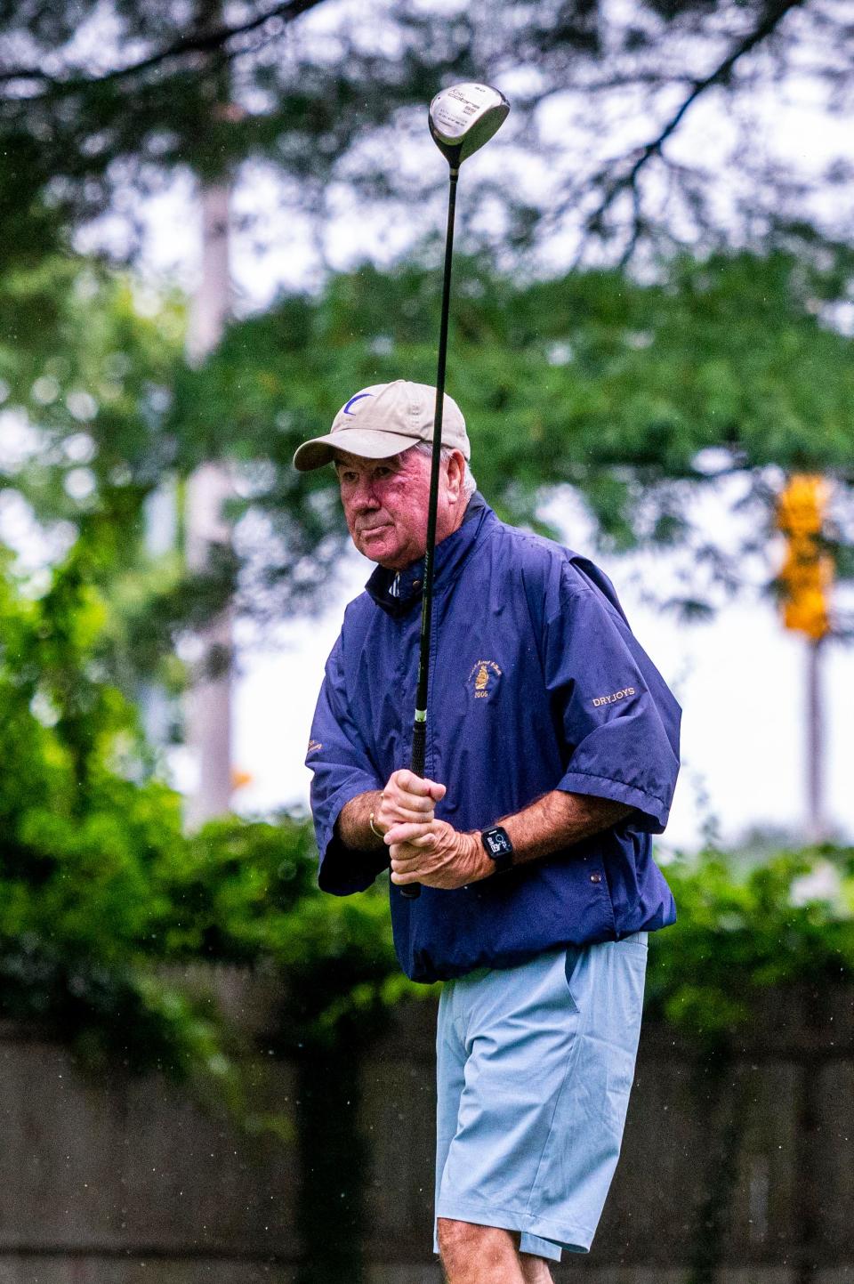 Jim Harrington tracks his drive on the second day of last year's CCNB Four-Ball Tournament. Harrington and John Rolli, golf partners at the annual tournament for 10 years, will be entering their final tournament there together this week.