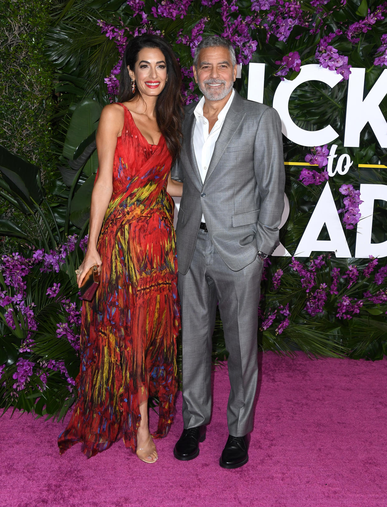 LOS ANGELES, CALIFORNIA - OCTOBER 17: Amal Clooney and George Clooney arrives at the Premiere Of Universal Pictures' 