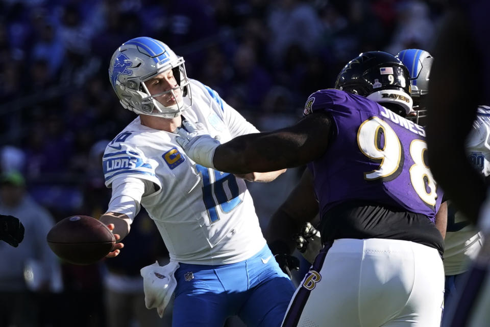 Baltimore Ravens defensive tackle Travis Jones (98) pressures Detroit Lions quarterback Jared Goff during the second half of an NFL football game, Sunday, Oct. 22, 2023, in Baltimore. (AP Photo/Alex Brandon)