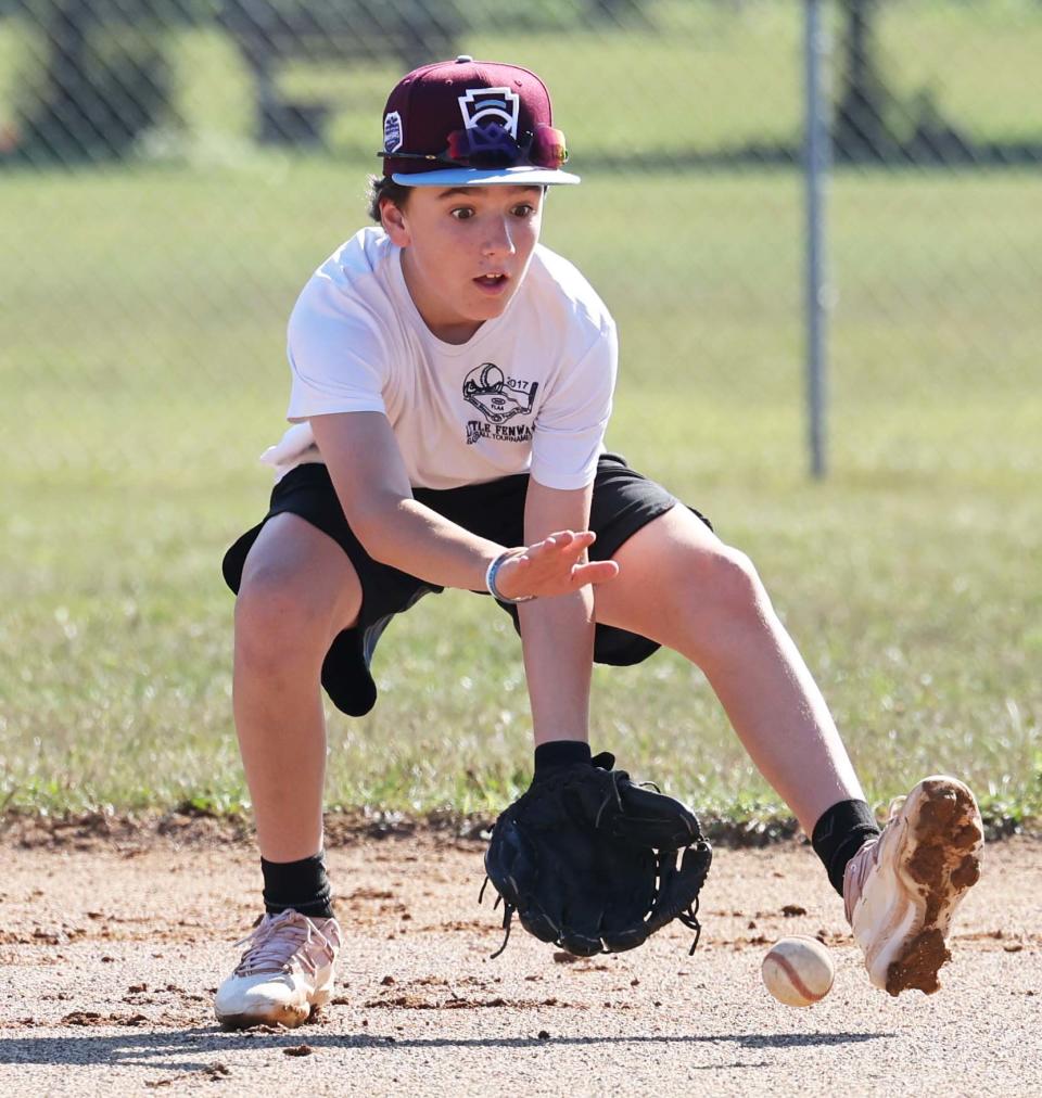 Mike Marzelli of the New England Little League champion Middleboro 12U Nationals fields ground balls during practice at the Little League World Series in South Williamsport, Pennsylvania, on Thursday, Aug. 18, 2022.
