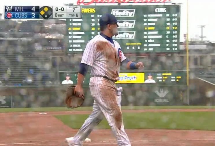 Kyle Schwarber sports a messy uniform as his double-error on Friday at Wrigley Field. (MLB)