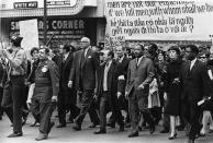 <p>Leading the march against the Vietnam conflict are Dr. Benjamin Spock, tall, white-haired man, and Dr. Martin Luther King Jr., third from right, in a parade on State St. in Chicago, Ill., March 25, 1967. Dr. Spock is co-chairman of the National Committee for Sane Nuclear Policy. (AP Photo) </p>