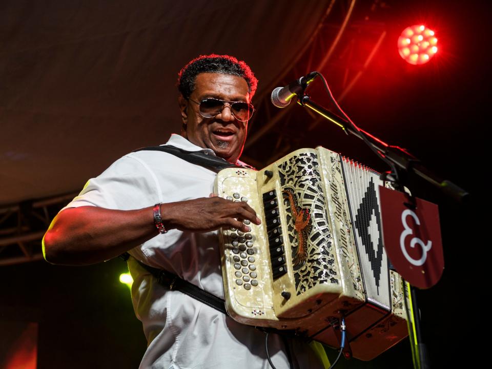 Chubby Carrier plays music with the Bayou Swamp Band during the W.C. Handy Blues & Barbecue Festival's Zydeco Night at Audubon Mill Park in Henderson, Ky., Thursday, June 13, 2019.