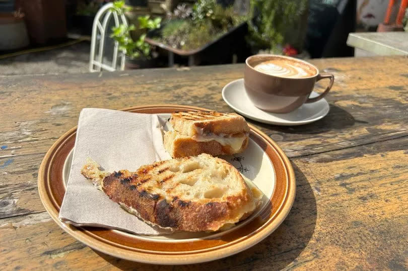 Photo shows the toastie and latte