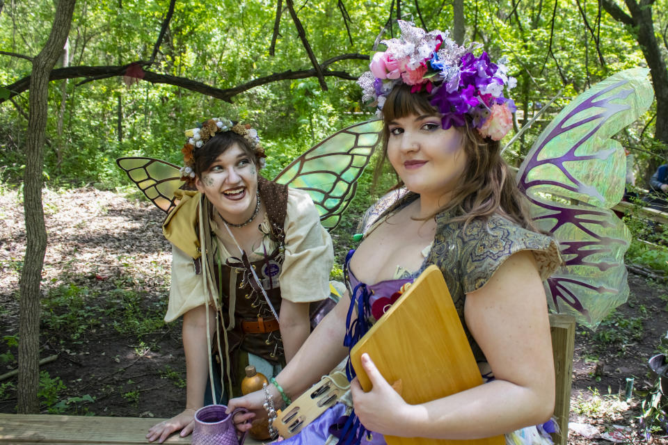 Women at a Renaissance Faire wearing costumes