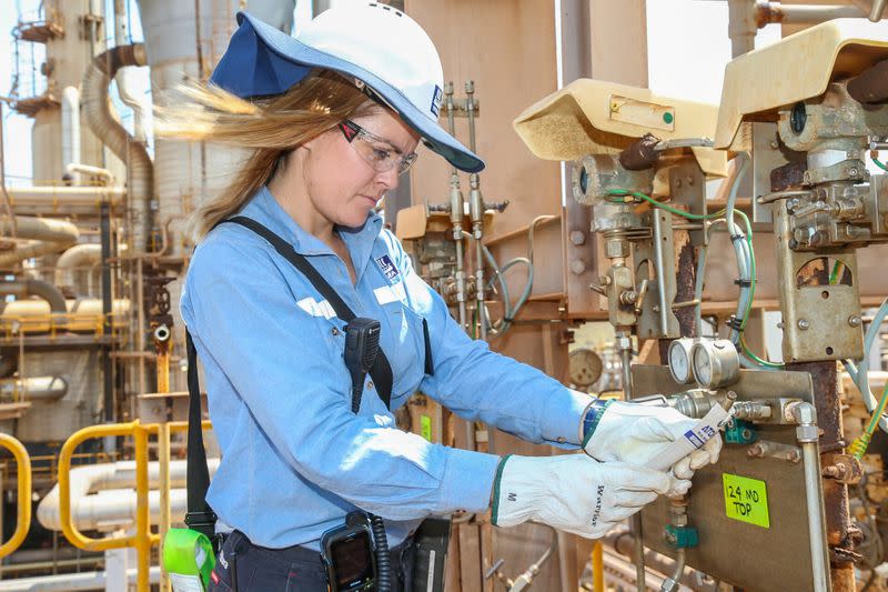 A woman works at a Yara's ammonia plant in Porsgrunn