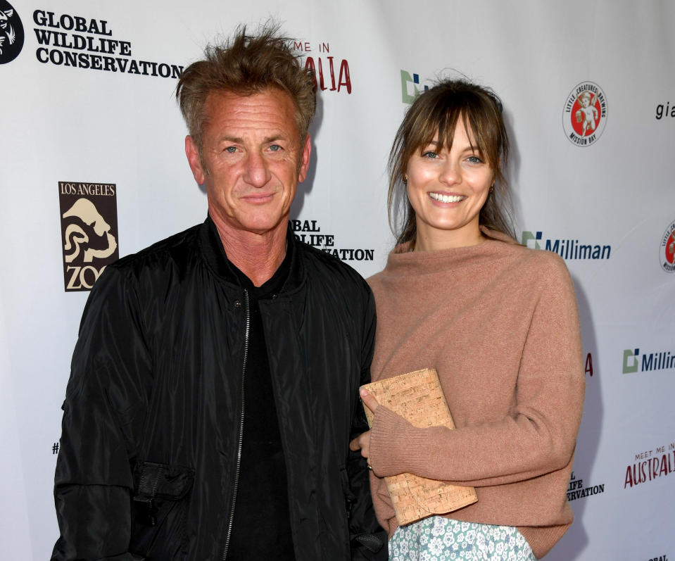 Sean Penn (L) and Leila George arrive at the "Meet Me In Australia" event benefiting Australia Wildfire Relief Efforts at Los Angeles Zoo on March 08, 2020 in Los Angeles, California. 